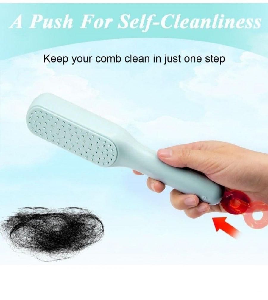 Self-cleaning massage comb