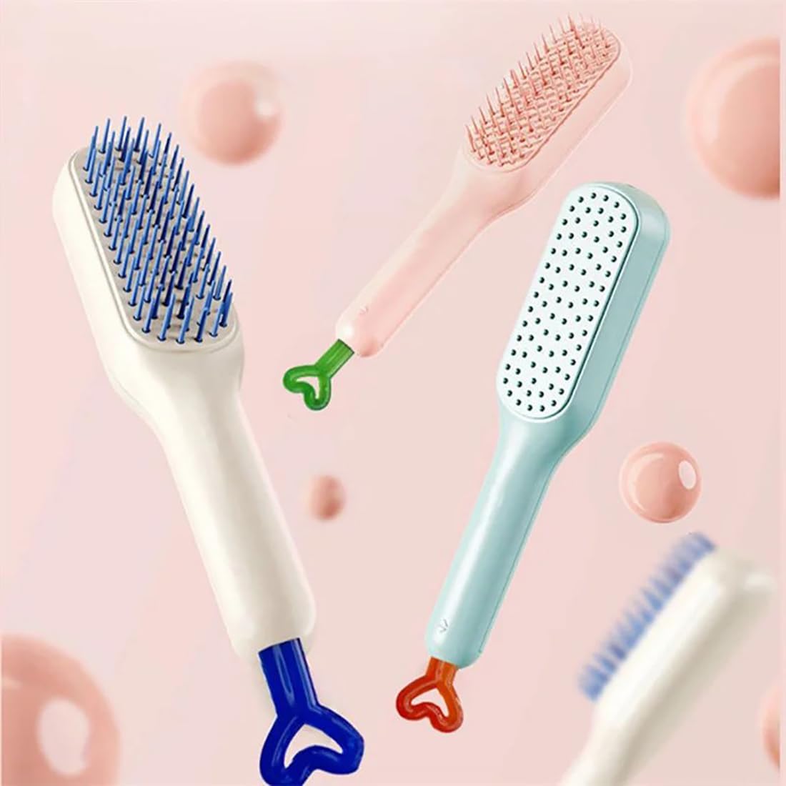 Self-cleaning massage comb