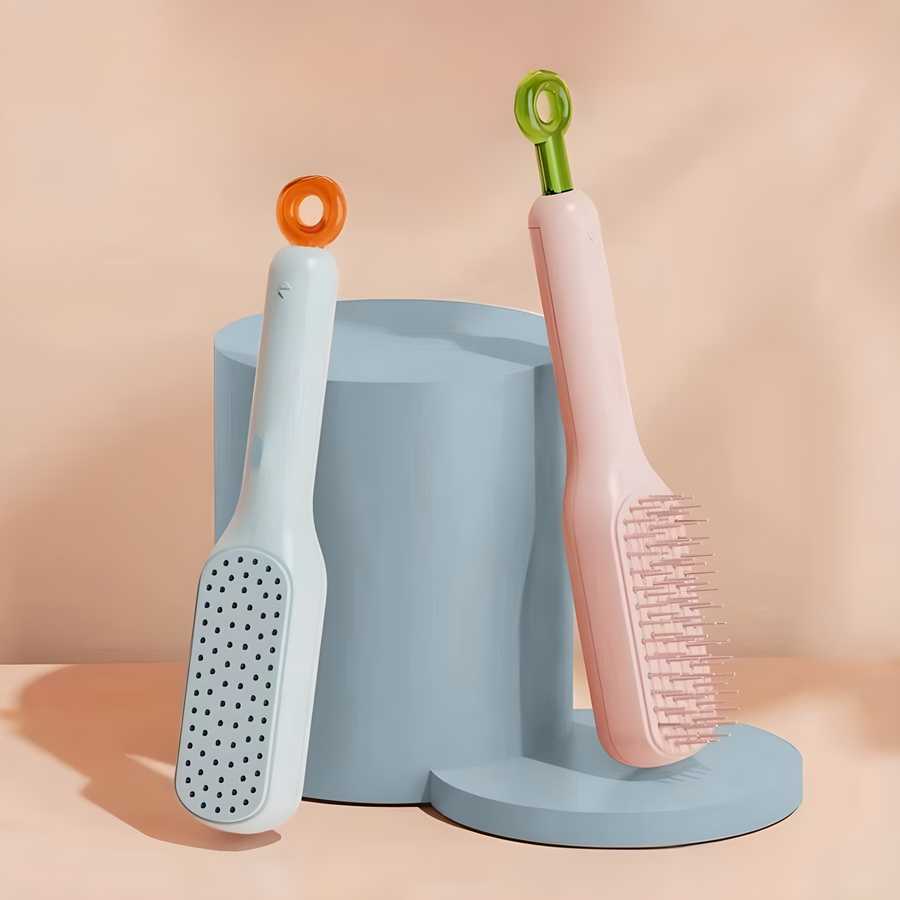 Self-cleaning massage comb