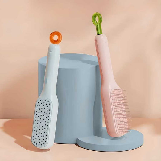 Self-cleaning massage comb